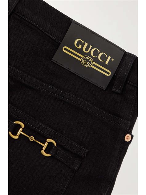 de pantaloncini gucci prezzo|gucci jeans net a porter.